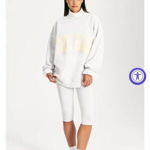 The Bar White Sweatshirt with Yellow Accents